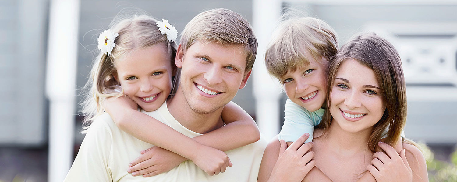 Photo of happy family after buying a house with the help of Der Nguyen, a good choice for anyone who needs to find an Edmonton real estate lawyer near me that offers cheap solicitor  fees to sell or buy a home, house or property