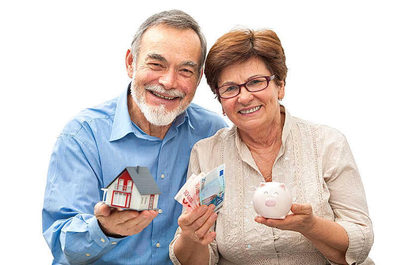 Seniors holding miniatures of assets considered in estate planning, delivered by the lawyers at Der Nguyen, an Edmonton law office offering legal help on how to write a will that ensures your intentions are followed