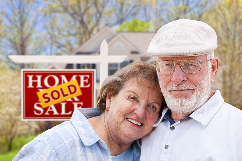 Seniors happy with the purchase of their home, completed with the legal help of the lawyers at Der Nguyen, an Edmonton law office offering reasonable legal fees to sell a home or property